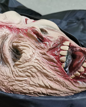 Melted Marty in body bag Life size crime victim